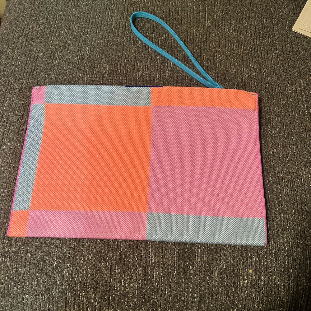 Rothy’s Big Pink Check essential pouch